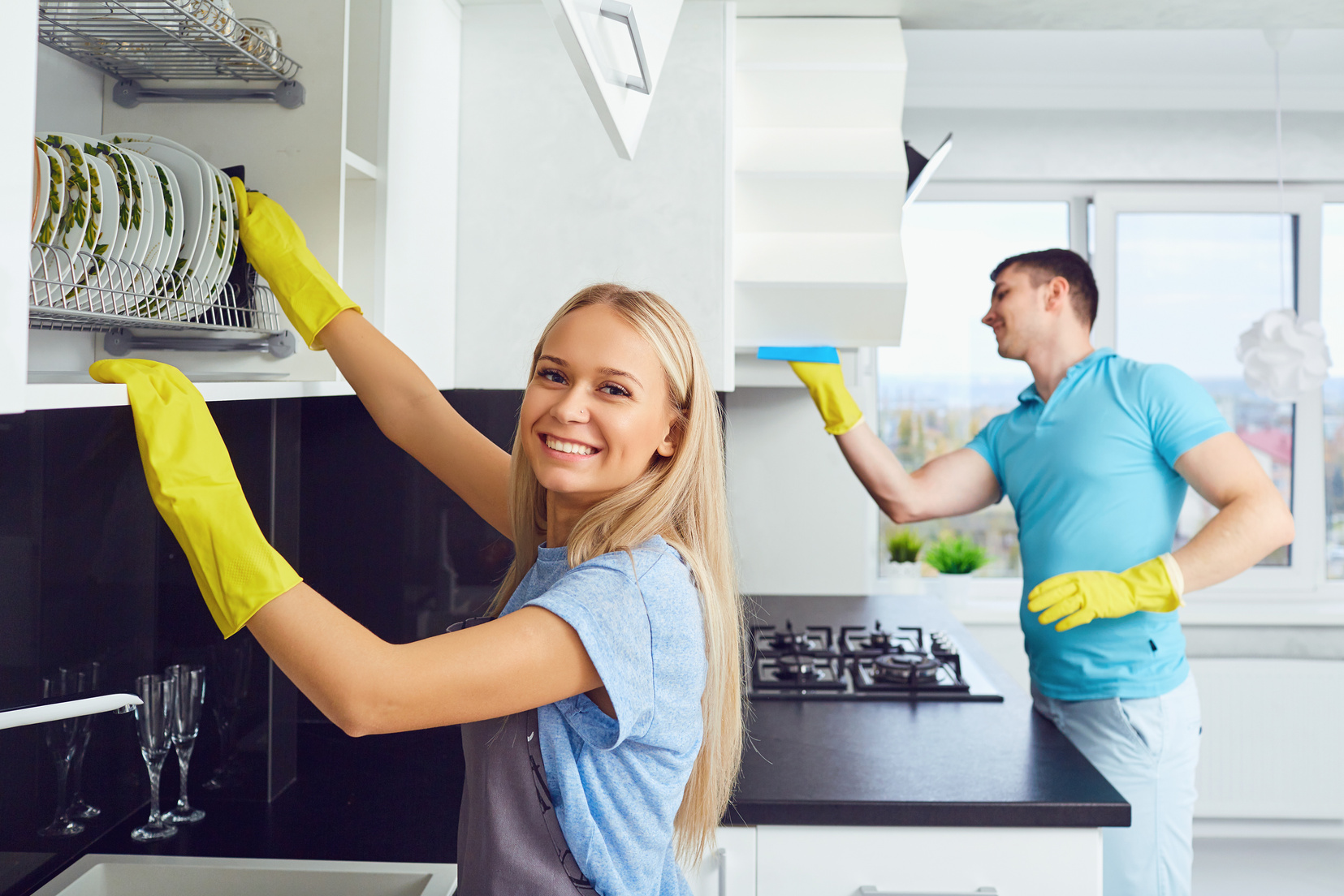 Couple Cleaning an Apartment